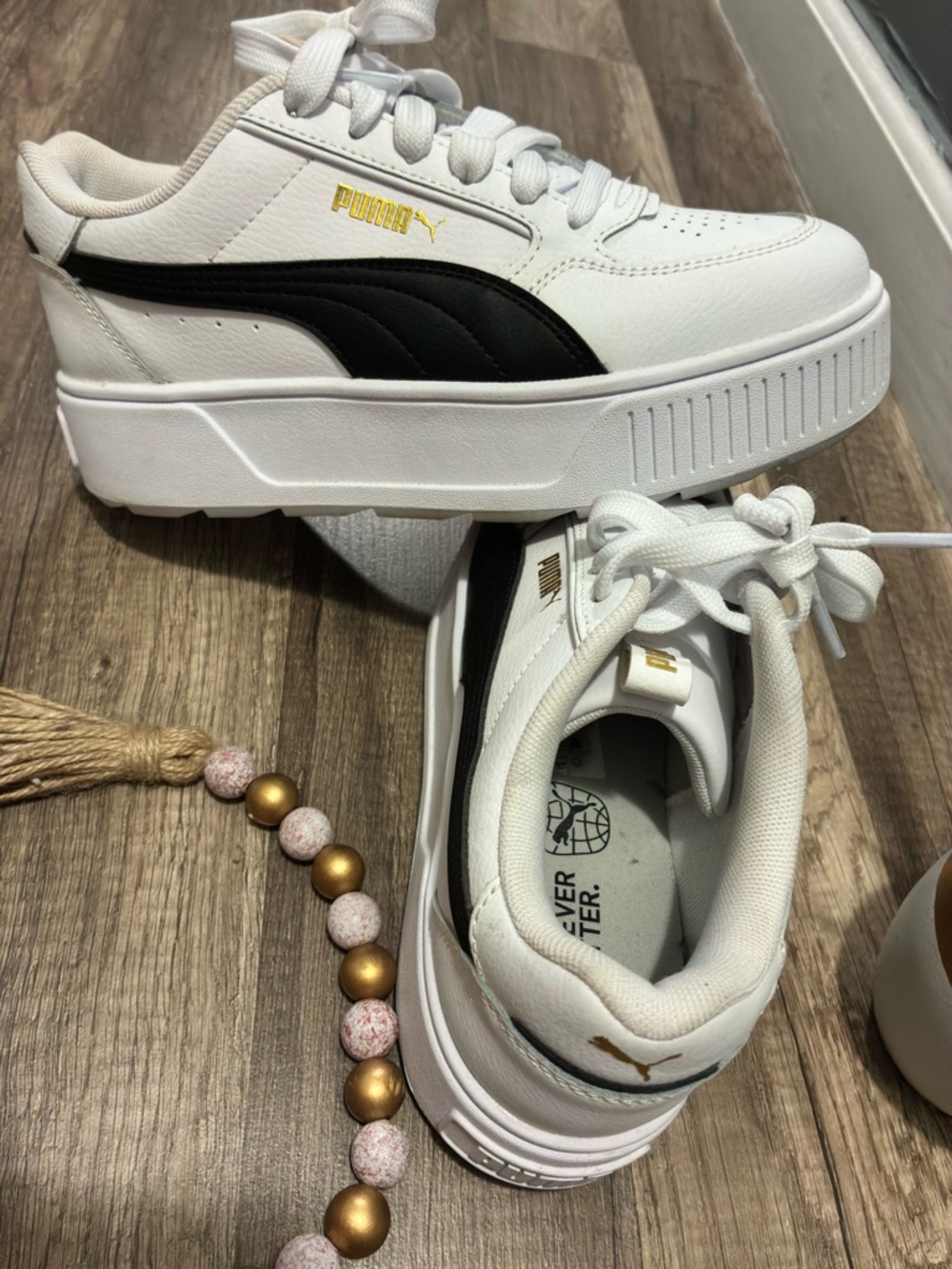 Puma White and Black Platform Sneakers with Gold Logo